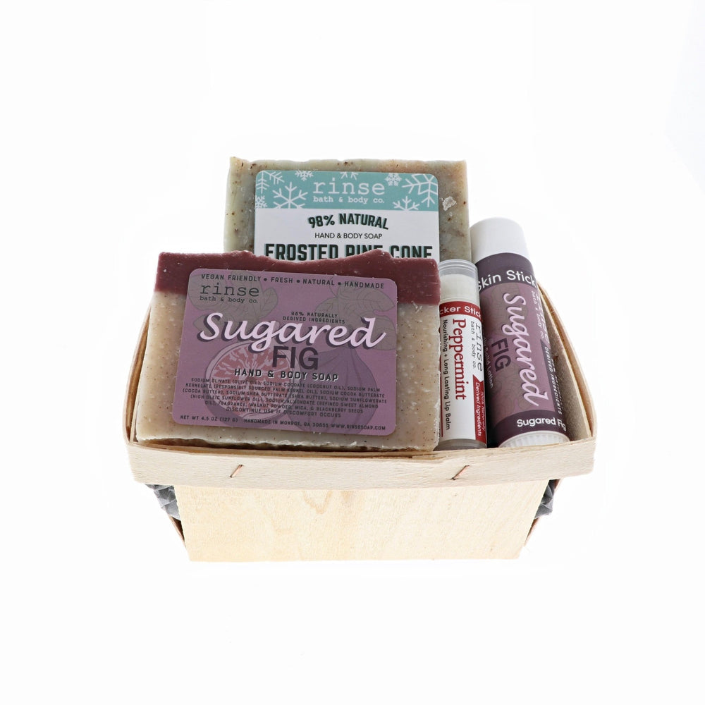 Wooden berry till cradling Frosted Pine Sugared Fig soap and lip care — compact holiday gift on white