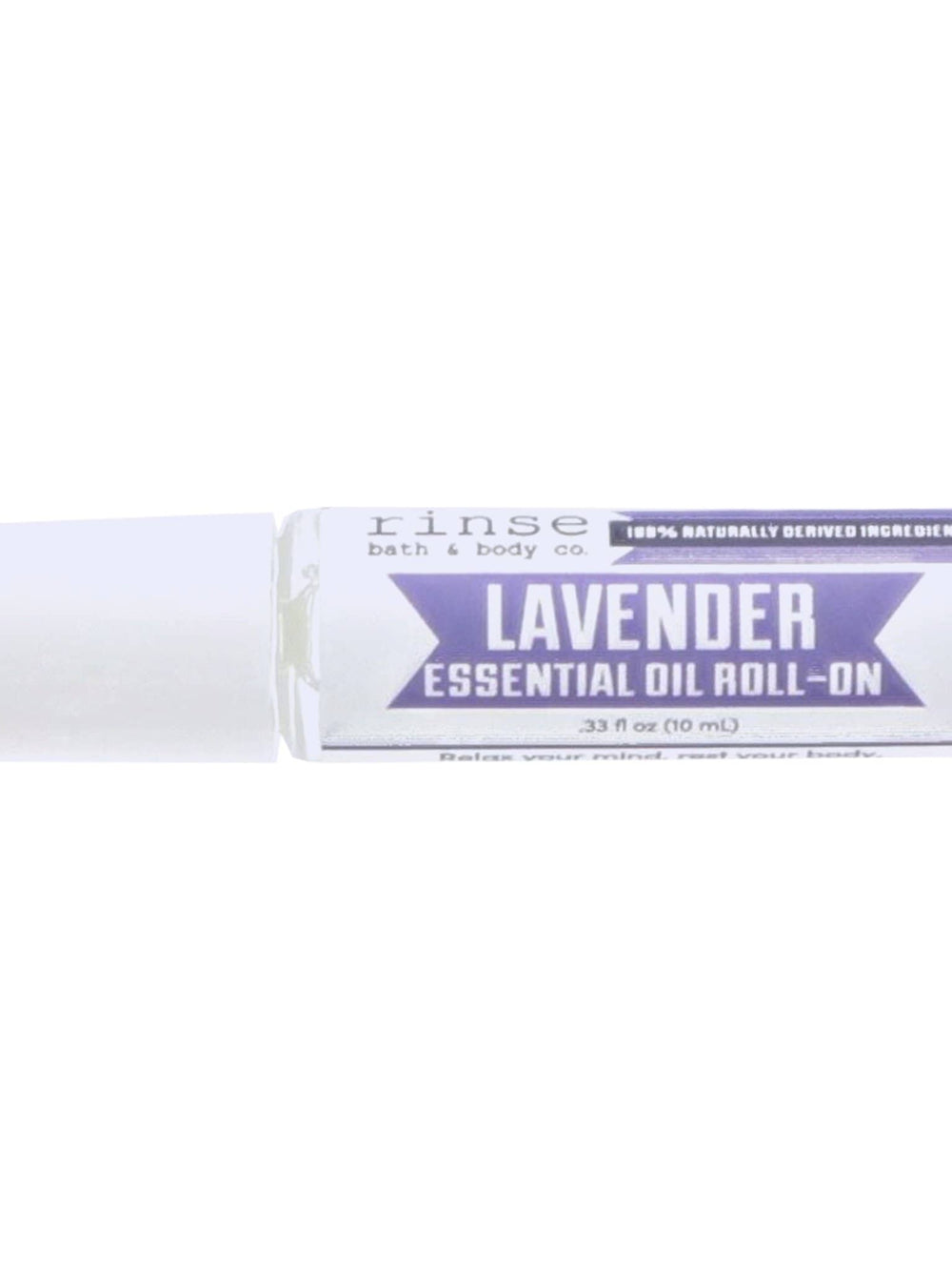 Lavender Essential Oil Roll-On lying on bright white — purple banner label and white cap in clean studio light
