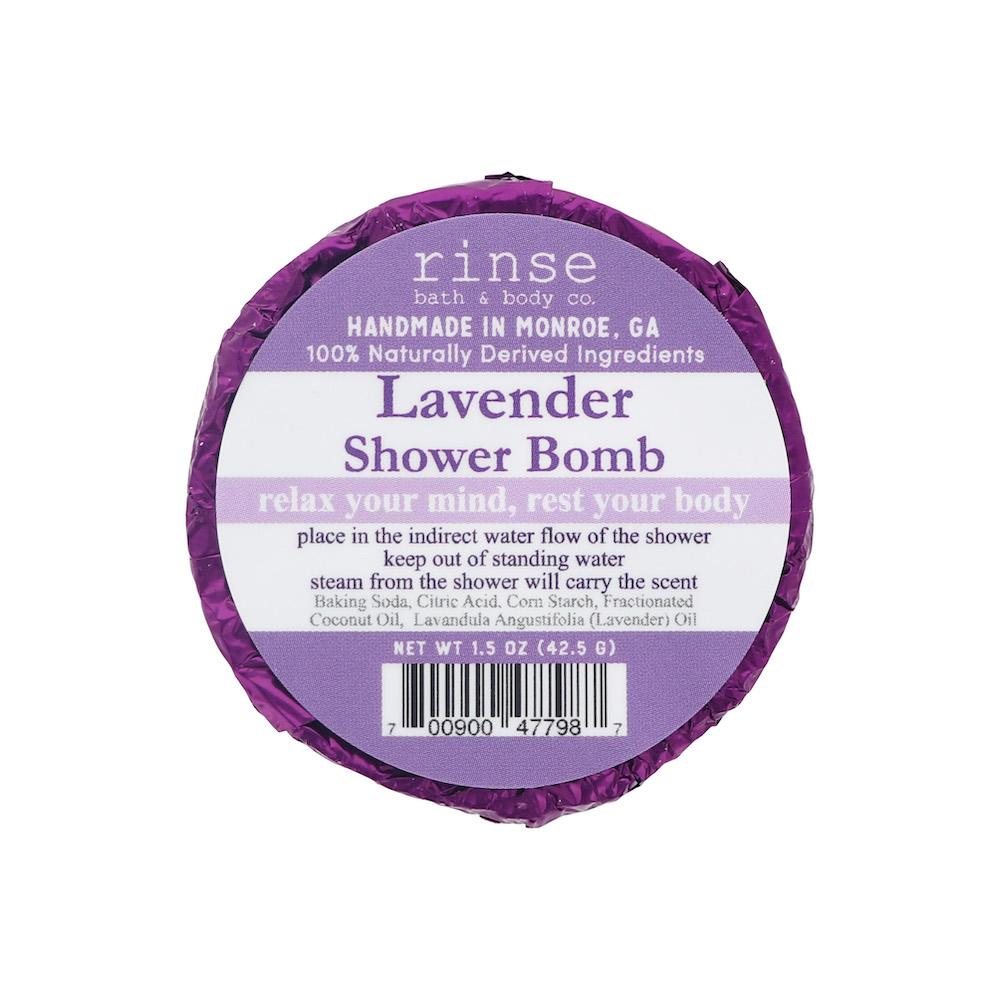 Single Lavender Shower Bomb faces the camera — purple foil and circular white label on white