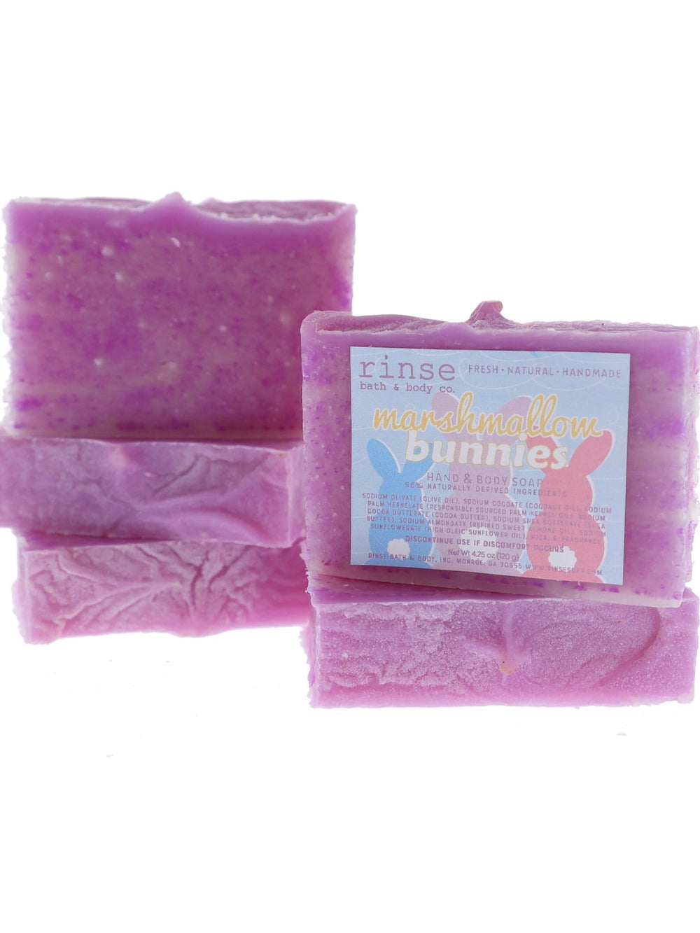 Marshmallow Bunnies soap stands before stacked twin bars — mottled violet cream on clean white