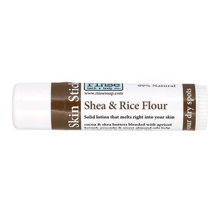 Shea & Rice Flour Skin Stick faces the label — cocoa brown bands on stark white