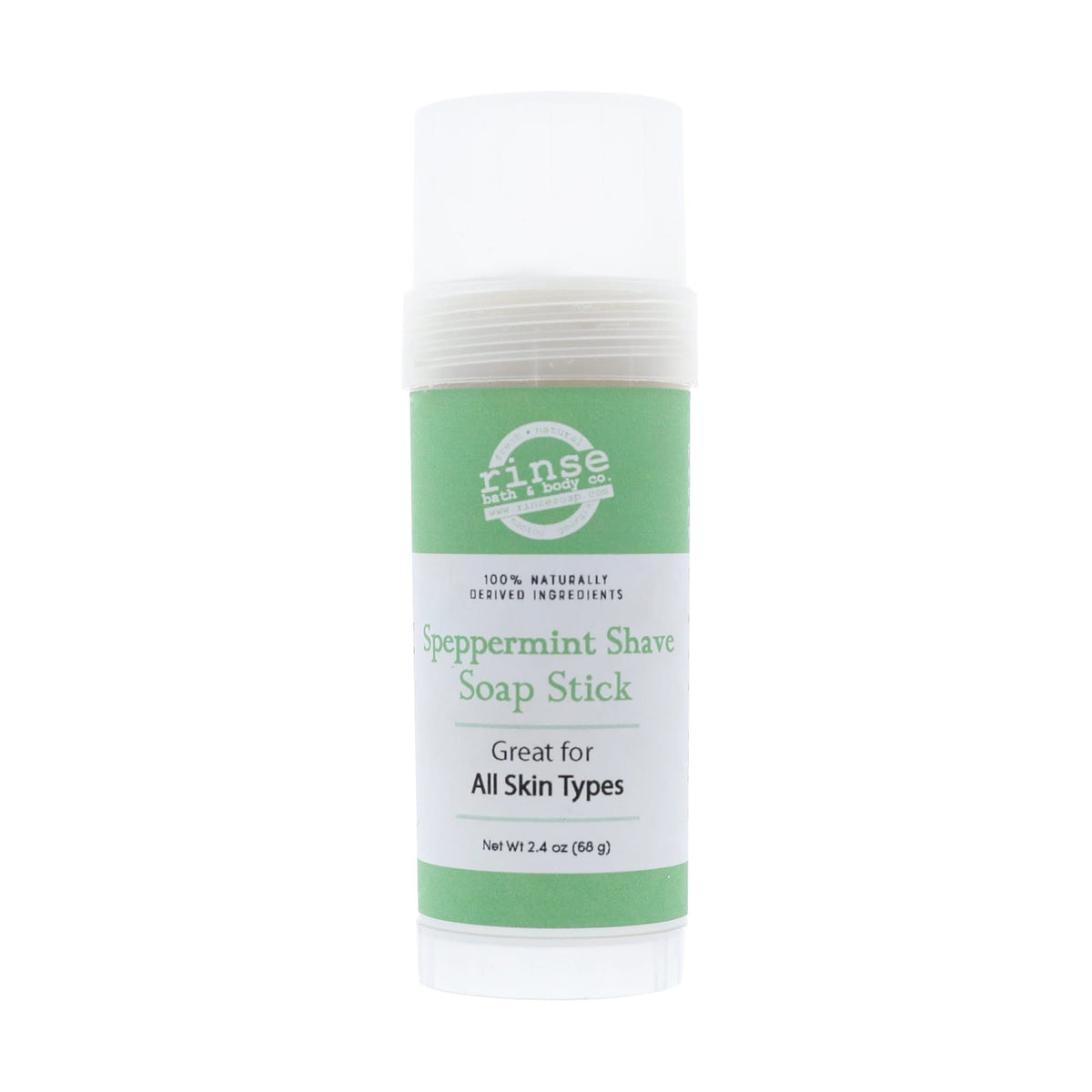 Speppermint Shave Soap Stick standing capped on bright white — translucent tube with green brand bands for travel shave soap