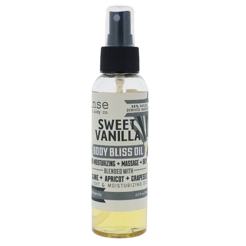 Sweet Vanilla Body Bliss Oil standing on bright white — golden oil and clean white label in studio light